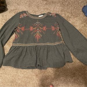 Women’s peplum top with beautiful embroidery design